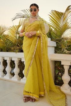 Lime yellow saree with badla placement embroidery and gota embellished border. Paired with mukaish work padded blouse. - Aza Fashions Semi-stitched Yellow Saree With Sheer Dupatta, Yellow Resham Embroidered Pre-draped Saree For Festivals, Yellow Semi-stitched Pre-draped Saree With Resham Embroidery, Yellow Pre-draped Saree With Resham Embroidery For Festive, Yellow Pre-draped Saree With Resham Embroidery For Festive Occasions, Festive Yellow Pre-draped Saree With Resham Embroidery, Designer Yellow Saree With Sheer Dupatta, Yellow Pre-draped Saree With Mirror Work For Eid, Yellow Anarkali Pre-draped Saree For Eid