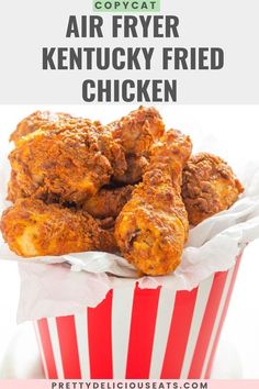 fried chicken in a red and white striped bucket with text overlay that reads, copycat air fryer kentucky fried chicken