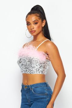 Dazzling sequins and pink feathers pave the way on this spectacular crop that's sure to be a hit from celebrations to nights on the town. • Pink Feather Trim• Adj. Straps• Pull On• Crop• Silver Sequins Sleeveless Feather Trim Party Tops, Fitted Party Tops With Feather Trim, Glamorous Party Top With Feather Trim, Sequin Crop Top For Club In Spring, Glamorous Feather Trim Top For Night Out, Sequined Crop Top For Spring Clubbing, Spring Sequin Crop Top For Club, Spring Party Crop Top With Sequins, Spring Party Sequin Crop Top