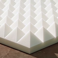 a close up view of a mattress on the ground