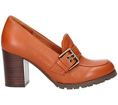 Funky retro-inspired style that pairs like a dream with your favorite jeans or a midi-length skirt, the Quinziano showcases a buckle accent, a tall chunky heel, and a comfy memory foam insole. From L'Amour Des Pieds. Chic Heels With Buckle Closure For Fall, Retro Heels With Buckle Closure For Work, Retro Workwear Heels With Buckle Closure, Fall Workwear Heels With Buckle Closure, Vintage Heels For Work, Vintage Heels With Buckle Closure For Work, Leather Heels With Buckle Closure For Fall, Modern Heels With Buckle Closure For Fall, Retro Leather Heels For Fall