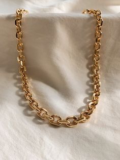 "Bold large link gold chain with lobster clasp closure - great to wear as a statement piece by itself or layered with other necklaces! CONTENT: -14k Gold Plated Chain -Lobster Clasp Closure -Adjustable Length: 16\" but can be made longer to 17\" -Chain Links are 2.8 mm -Handmade in Los Angeles CARE: We do recommend keeping plated jewelry as dry as possible, as you run the risk of tarnishing when you allow the metal to react with any other liquids. To further prevent any damages or tarnishing, pl Thick Gold Chain Necklace, Thick Gold Chain, Thick Chain Necklace, Gold Disc Necklace, Chunky Chain Necklaces, Gold Link Chain, Toggle Necklace, Layered Necklace Set, Gold Necklace Women