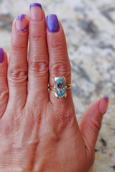 This is such a beautiful aquamarine 4CT marquise cut 14K gold ring, size 7. The color of the the stone is just breathtaking, the light blue color was hard to display but if you need more images please email me. The cut is cold to the touch, and very good quality. It is made from the 1960's-1970's. Vintage or Antique. This would make a stunning gift or engagement ring if you are into this style. Aquamarine Gold Ring, Etsy Gold Ring, 14k Gold Ring, San Antonio Tx, Light Blue Color, Marquise Cut, Ring Size 7, Rings Statement, San Antonio