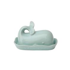 a ceramic whale shaped dish on a white background