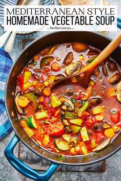 a pot full of vegetable soup with a wooden spoon in it and the title overlay reads mediterranean style homemade vegetable soup