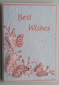 a card with pink butterflies on it and the words best wishes written in large letters