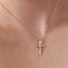 The intricately designed Cross Necklace, skillfully fashioned from 14K Gold, is an elegant and sophisticated accessory that adds a touch of refinement to any ensemble. Featuring a delicate cross pendant gracefully suspended from a fine gold chain, it is suitable for both everyday wear and special occasions. The use of 14k gold not only ensures durability but also imparts a lasting radiance. Here are the key details: Artisanally crafted from 14k solid gold All materials responsibly sourced from t Christian Cross Necklace, Cross Necklace Women, Protection Jewelry, Christian Cross, Key Details, Real Gold, Mother's Day Gift, Chain Styles, Cable Chain