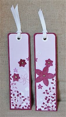 two tags with flowers and butterflies on them