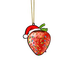 an ornament shaped like a strawberry with a santa hat on it's head