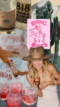 a woman wearing a cowboy hat and holding a pink sign in front of some drinks