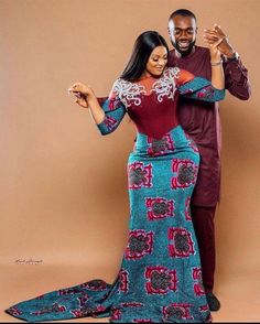 Come slay with Your Spouse in this stunning matching set.  This beautiful set will make You both stand out in that event You'll be attending.  This  piece is made of 💯 cotton wax, suitable for weddings, anniversaries, family portrait, child dedication and lots other occasions. The Female dress is adorned with quality appliques and has zipper at the back for easy wear. *Please include Your height and that of Your Spouse to aid Us in predicting the suitable length for both outfits* LAUNDRY GUIDE Fitted Multicolor Gown For Traditional Ceremonies, Traditional Ankara Fabric Dress For Wedding, Fitted Gown With Traditional Patterns And Long Sleeves, Fitted Long Sleeve Gown With Traditional Patterns, Fitted Ankara Fabric Sets For Wedding, Fitted Sets With Traditional Patterns For Party, Fitted Party Sets With Traditional Patterns, Traditional Ankara Fabric Sets For Wedding, Ankara Couple Outfit