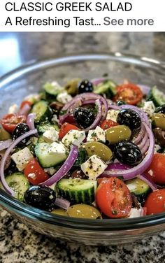 a glass bowl filled with lots of different types of vegetables