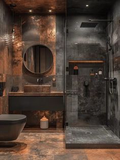 a bathroom with a sink, toilet and shower stall in the middle of the room