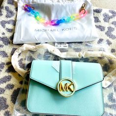 **Brand New** Michael Kors Carmen Medium Flap Leather Handbag In A Gorgeous Aqua Color!! Bonus: Free Colorful / Vibrant Chain For Your Bag!! Enjoy Ladies!! Xx Designer Satchel With Chain Strap For Shopping, Designer Blue Bag With Chain Strap, Aqua Color, Leather Handbag, Michael Kors Bag, You Bag, Leather Handbags, Crossbody Bags, Michael Kors