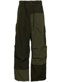 khaki green ripstop texture patchwork design front button and zip fastening elasticated drawstring waistband belt loops two side slash pockets two rear flap pockets drawstring hem straight leg Green Outdoor Bottoms With Patch Pockets, Military Style Khaki Parachute Pants With Patch Pockets, Green Parachute Trousers With Side Pockets, Green Cargo Style Parachute Pants For Outdoor, Green Techwear Pants With Multiple Pockets, Green Military Parachute Pants With Side Pockets, Green Techwear Cargo Parachute Pants, Green Parachute Pants With Cargo Pockets, Green Nylon Parachute Pants With Cargo Pockets