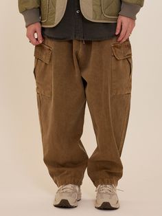 Editor's NotesPigment-washed cargo pants from CARGOBROS feature a wide silhouette and banding closure for comfortable fitting.- Banding closure- Wide fit- Drawstring at waist- Pigment washing denim- Versatile and casual itemMeasurements(in.)One size- Total length: 39.37 in.- Waist: 13.38 - 19.29 in.- Thigh: 16.53 in.- Front rise: 16.53 in.- Hem: 8.66 in.Model infoMan - 5'74 Composition & Care- 100% Cotton- Please check the care labelDesigner- by CARGOBROS Baggy Utility Khaki Jeans, Baggy Brown Cargo Style Bottoms, Brown Cotton Pants With Multiple Pockets, Brown Baggy Cargo Style Bottoms, Vintage Cargo Jeans For Fall, Brown Wide Leg Parachute Pants With Belt Loops, Brown Straight Leg Cargo Pants With Multiple Pockets, Brown Baggy Utility Pants, Baggy Brown Cargo Pants With Side Pockets