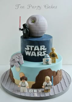 a star wars themed cake with legos on top