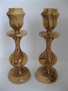 two wooden candlesticks sitting next to each other on a white background with the ebay logo