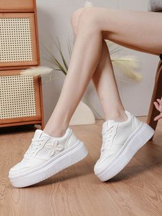 Discover your perfect outdoor companion with our Four-Leaved Clover Lace Thick-Soled Platform Sneakers. These stylish and durable sneakers provide extra support and traction, making them ideal for all your outdoor adventures. Color : White Style : Sporty Toe : Round Toe Strap Type : Lace Up Upper Material : PU Leather Lining Material : Fabric Power Supply : None Size US Ball Girth Foot Length Platform Height EUR36 US6 8.2 9.1 1.4 EUR37 US6.5 8.4 9.3 1.4 EUR38 US7 8.6 9.6 1.4 EUR39 US8 8.8 9.8 1. Breathable Synthetic Lace-up Platform Sneakers, Spring Outdoor Low-top Sneakers, White Breathable Platform Sneakers With Round Toe, Spring Lace-up Platform Sneakers With Cushioned Footbed, Spring Sports Sneakers, Walking Shoes For Outdoor Activities In Spring, Spring Outdoor Sneakers With Textured Sole, Breathable Lace-up Platform Sneakers In Synthetic, White Breathable Platform Sneakers For Spring