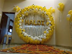 balloons and streamers decorate the entrance to a party