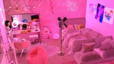 a bedroom with pink walls and furniture in the room is lit up by bright lights