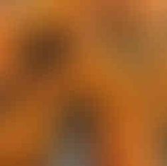 blurry image of an orange and yellow background