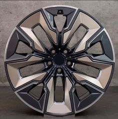 a wheel that has been painted black and silver