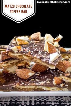 a white plate topped with chocolate and nuts