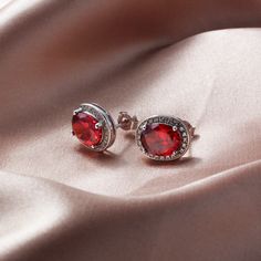 Material:100% 925 Sterling Silver with White Gold Plated Main stone:Cubic Zirconia Gemstone Other stone: CZ Weight:3g Size:1/2 x 3/8 inches Condition:New Main color:Red Quantity:1 pair This earrings are made with red and white cubic zirconia stones and solid 925 sterling silver w/ Rhodium gold plating for better quality and prolonged shine! *It comes with elegant velvet jewelry gift bag. Please check my other beautiful silver jewelry: www.etsy.com/shop/Chainstones 100% refunds are always availab Ruby Crystal, Ruby Earrings, Cubic Zirconia Earrings, Zirconia Earrings, Trendy Designs, Design Silver, Silver Pendant Necklace, Jewelry Lover, Silver Earrings Studs