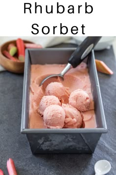 a bowl filled with ice cream next to some candy