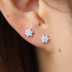 • Our sweet and dainty mini flower earrings are an essential! • Hypoallergenic, lead-free, tarnish/scratch resistant material • Length: Approx. 1.2mm • Material: Surgical Steel, Sterling Silver • Available in Silver Ear Piercing Studs, Beautiful Flower Designs, Flower Ear, Tiny Stud Earrings, Tiny Studs, Stud Jewelry, Girl Jewelry, Flower Earrings Studs, Opal Earrings