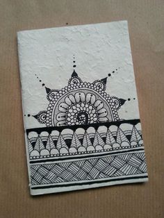 a piece of paper with an intricate design on it