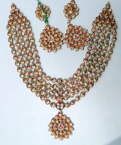 "Classic Vintage elegant 20 carat solid gold, Old cut Diamonds and coloured stones with multicolor Enamel work 5 rows necklace (Kundan Meena choker) with Matching Earrings. Ideal for any occasions A good size necklace with many stands of clear diamonds, great craftmanship. Length of necklace -23 cm (9.05) Size could be adjusted according to your requierment by adding adjustable cord. Width of Center piece-9 cm (3.15\"), total weight of set 141.450 Grams(4.99 ounce). Length of earrings-7 cm,width Multicolor Jewelry For Formal Festivals, Traditional White Jewelry For Festivals, Multicolor Formal Jewelry For Festivals, Gold Kundan Jewelry With Motifs, White Temple Jewelry With Motifs, Multicolor Formal Jewelry For Diwali, White Meenakari Jewelry For Diwali, White Meenakari Temple Jewelry, Formal Multicolor Meenakari Jewelry