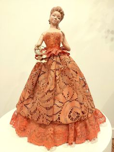 This amazing Jamar Mallory ceramics was made in 1959. For its age is in good shape. As you can see in the photos one of the arms has been repaired.  She is wearing a beautiful orange lace dress.  Will look fantastic in any home. Peach Lace Dress, Orange Lace Dress, Peach Lace, Gift For Mothers Day, Ceramic Figurine, Ceramic Figurines, Mother Day Gifts, Lace Dress, Mothers Day