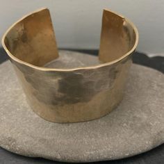 Our wide bronze cuff is hand forged and given a unique textured finish. The forging process creates a slightly different finish on each piece. No two bracelets are exactly alike. A true one of a kind just like you.This is a great idea for a bronze anniversary giftOur current processing time is 5-7 business days. This is the amount of time it takes to create your piece before we ship it. if you need your order sooner we have rush processing available which you can purchase here.https://www.etsy.c Luxury Bronze Cuff Bracelet Gift, Unique Hammered Brass Cuff Bracelet, Bronze Hand Cast Cuff Bracelet Gift, Hand Cast Bronze Cuff Bracelet For Gift, Hand Cast Bronze Cuff Bracelet Gift, Bronze Hand Forged Cuff Bracelet As Gift, Bronze Hand Forged Cuff Bracelet Gift, Hand Forged Bronze Cuff Bracelet For Gift, Hand Forged Bronze Cuff Bracelet Gift