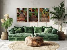 a living room filled with green furniture and plants