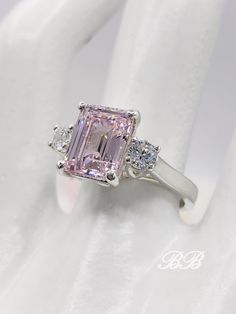 Classic Morganite Wedding Ring With Brilliant Cut, Brilliant Cut Morganite Wedding Jewelry, Morganite Diamond-cut Wedding Jewelry, Morganite Diamond-cut Jewelry For Wedding, Morganite Radiant Cut Jewelry For Anniversary, Morganite Diamond Cut Wedding Jewelry, Morganite Diamond Cut Jewelry For Wedding, Wedding Morganite Diamond Cut Jewelry, Cubic Zirconia Asscher Cut Ring With Accent Stones