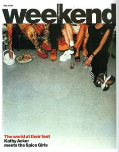 a magazine cover with people sitting on the floor