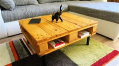 a wooden coffee table sitting in front of a couch