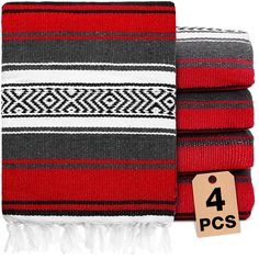 three red and black striped blankets next to a tag with the number four on it