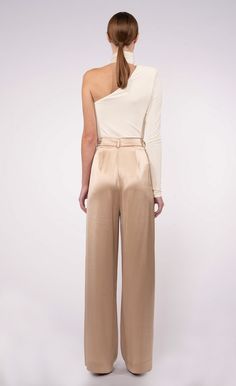 Our Paris Pant is a high-waisted, wide-leg pant. Simple, yet elegant the silky look elevates the overall appearance of the pant. The small touches such as pleats and the front zipper closure make them all the more unique. Jumpsuit And Blazer, Kids Boutique, Active Wear Shorts, Dresses Kids Girl, Clothing Essentials, Sweater Sale, Romper Dress, Dress Romper, Skirted Swimwear