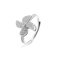 a white gold and diamond flower ring