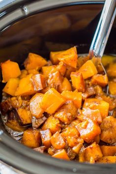 the food is being cooked in the slow cooker