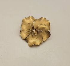 Vintage 12K Gold Filled Flower Pin - Textured Gold Filled Dainty Floral Brooch - Floral Jewelry - Nature Jewelry - Gift Idea for Her -K#1368 - 12K Gold Filled Pin - Marked gold filled on rear of pin - Pin back holds well and tight - Textured and high polished finishes  - Height: 1 1/2 inches - Width: 1 1/4 inches - Weight: 6.5 grams - Clean and in good condition Gold Flower-shaped Brooch With Floral Decoration, Gold Brooch With Flower Decoration For Formal Occasions, Gold Flower Lapel Pin, Gold Flower-shaped Brooches For Wedding, Gold Flower-shaped Wedding Brooches, Gold Flower Shaped Wedding Brooches, Gold Wedding Brooches In Flower Shape, Jewelry Nature, Vintage Fans