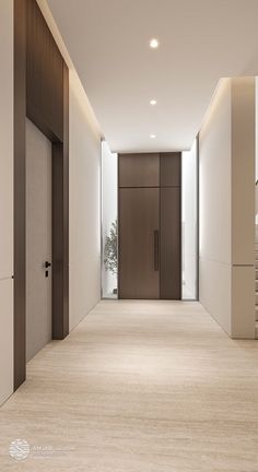 an empty hallway with wooden doors and white walls