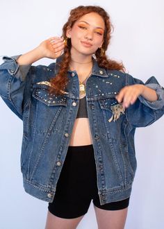 "Vintage 80s denim jacket. The ultimate classic 80s denim jacket is full of fun studded Southwestern jewels. Boxy oversized silhouette. Long sleeves. Bust and waist pockets. Front button fastening. Unlined. We kindly ask that you please view all measurements for comparison so you can get your desired fit. * Brand: Freeco Western * Decade: 1980s * Fabric: 100% Cotton * Lining: Unlined * Color: Medium Denim Wash C O N D I T I O N * Excellent vintage condition * Minimal pre-wear * No visible flaws Trendy Denim Jacket With Pockets For Festivals, Trendy Festival Denim Jacket In Medium Wash, Trendy Medium Wash Denim Jacket For Festivals, Festival Denim Jacket With Pockets In Medium Wash, Festival Medium Wash Denim Jacket With Pockets, Vintage Denim Jacket For Festivals, 80s Denim Jacket, Denim Jacket Fits, 80s Denim