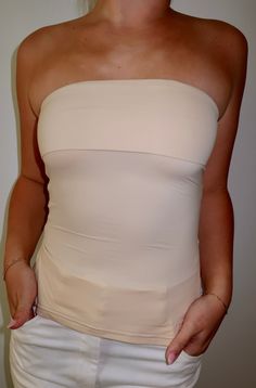 strapless tube top side slit detailing the perfect basic for layering and to elevate your wardrobe model wearing size small New Arrival Dress, Swimwear Accessories, Men's Collection, Tube Top, Girls Trip, Sales Gifts, Layering, Lounge Wear, Wardrobe