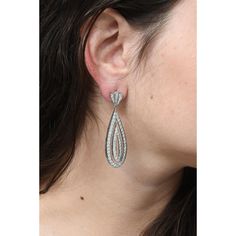 These earrings dance on the ear since both diamond tear drops dangle off the ear individually.  Set in 18kwg with 4 carats of diamonds, the earrings measure 2 1/4" tall by 5/8" wide.  Please see the measurements noted above in the description for best approximate dimensions Diamond Teardrop Chandelier Earrings, Diamond White Teardrop Chandelier Earrings With Diamond Accents, Silver Diamond Teardrop Earrings, Silver Diamond Teardrop Earrings In Pear Shape, White Gold Teardrop Chandelier Earrings With Diamond Accents, Brilliant Cut Teardrop Diamond Earrings For Party, Teardrop Diamond Pierced Earrings, Glamorous Teardrop Diamond Earrings, Glamorous Diamond White Teardrop Earrings