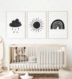 a baby's room with three pictures on the wall and a crib in the foreground