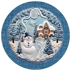 a blue and white plate with a snowman on it